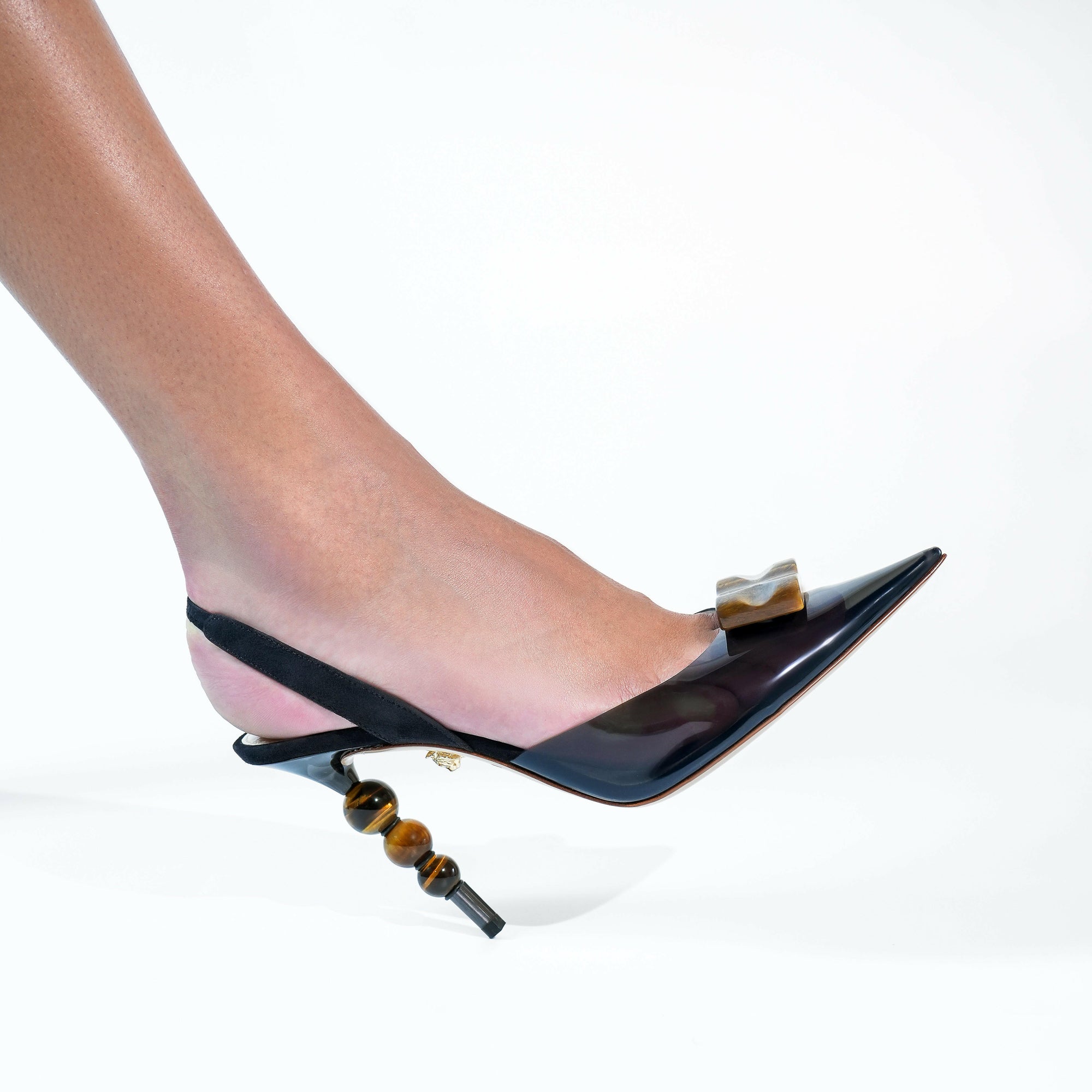 Sophisticated heel shoe for ladies featuring three stones for mind, body, and soul